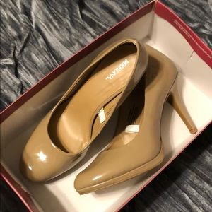 Nude pumps.